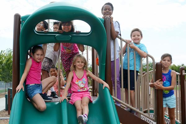 Westlake Village children enjoy the new playground. Photo by Yvonne Hunter.